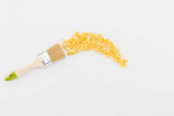 Brush leaves trail of pasta — Stock Photo, Image