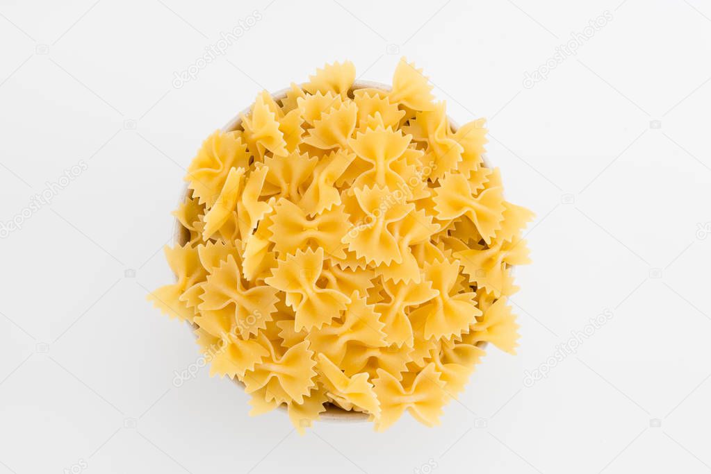 Uncooked macaroni in plate