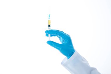 Doctor holding syringe
