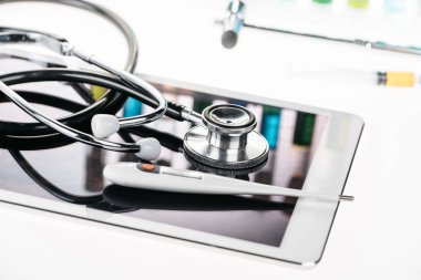 stethoscope and digital tablet clipart