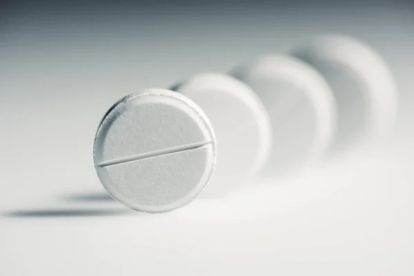 Round white tablets — Stock Photo, Image