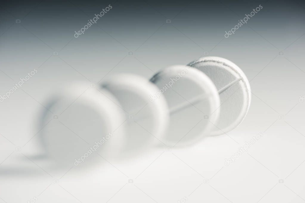 Round white tablets  