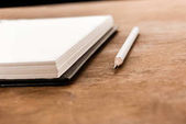 Ceruza és notebook tábla
