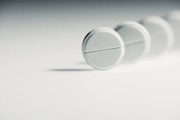 Round white tablets — Stock Photo