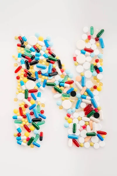 Letter from medical pills — Stock Photo