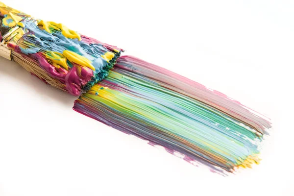 Brush and colorful brushstroke — Stock Photo