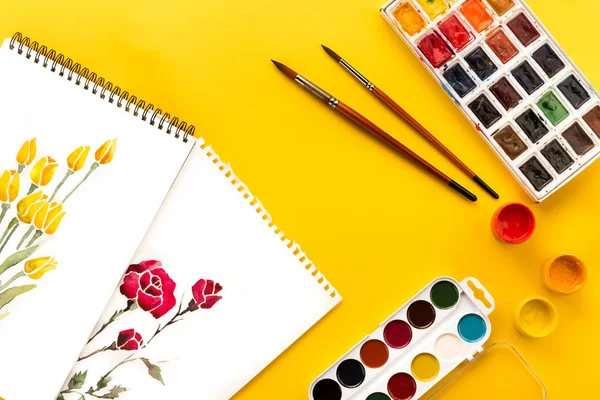 Drawings, paints and brushes — Stock Photo