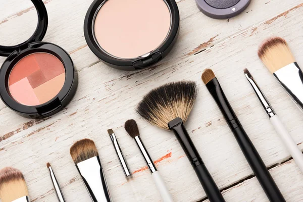 Brushes and decorative cosmetics — Stock Photo