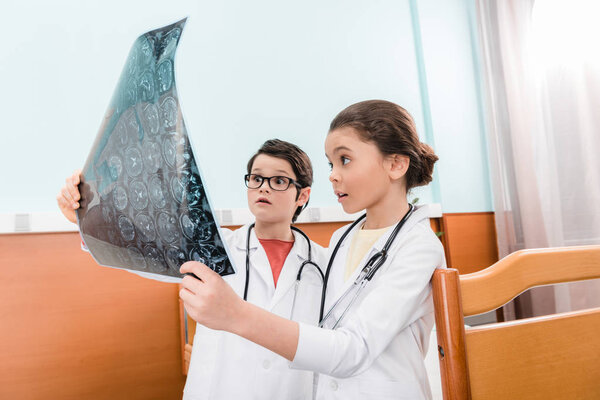 Kids doctors with x-ray