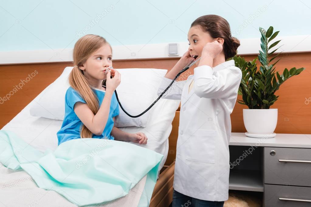 Kids playing doctor and patient 