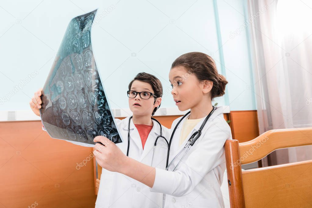 Kids doctors with x-ray