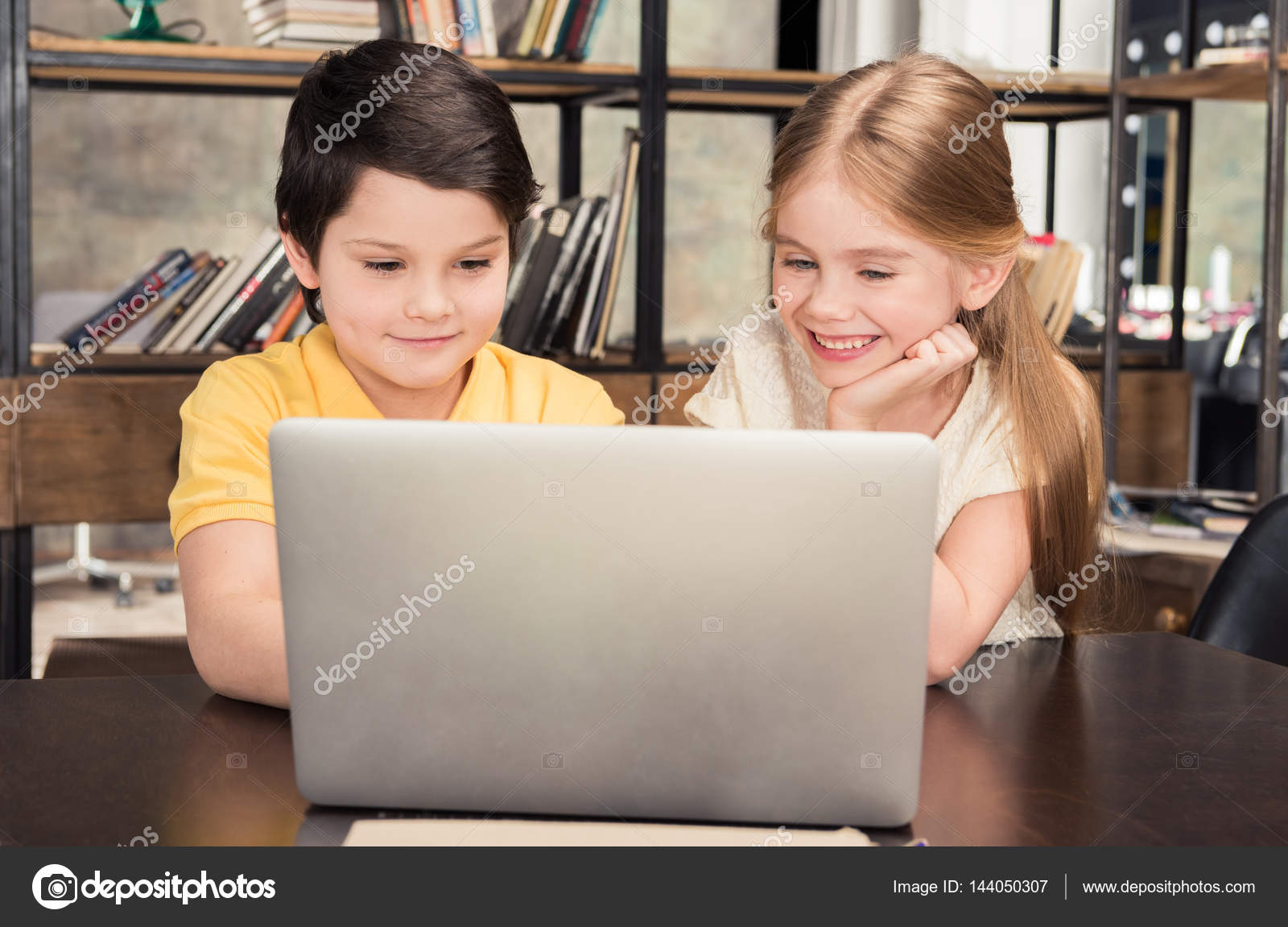 Children using laptop Stock Photo by ©ZaraMuzafarova 144050307