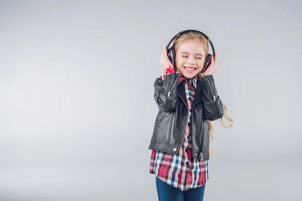 Little girl in headphones — Stock Photo, Image