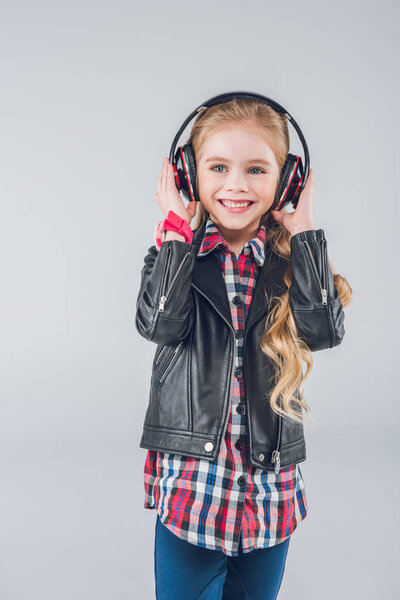 Little girl in headphones