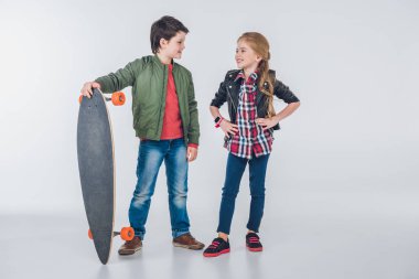 Boy and girl with skateboard