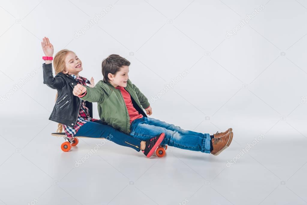 Boy and girl with skateboard