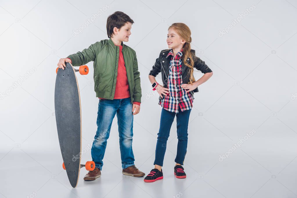 Boy and girl with skateboard