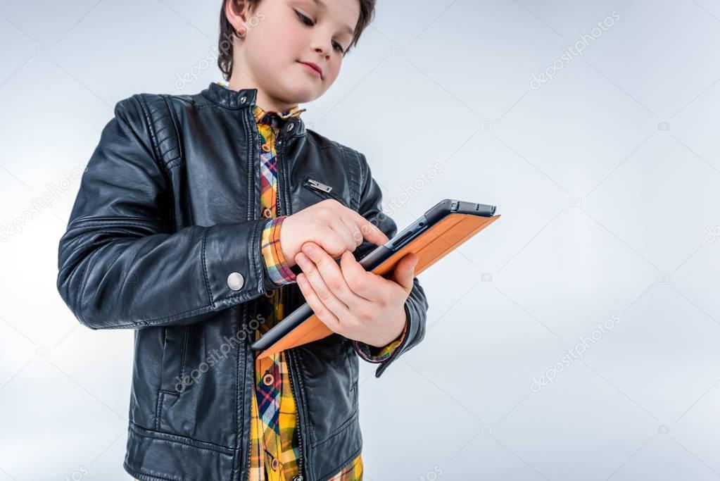 boy using digital tablet