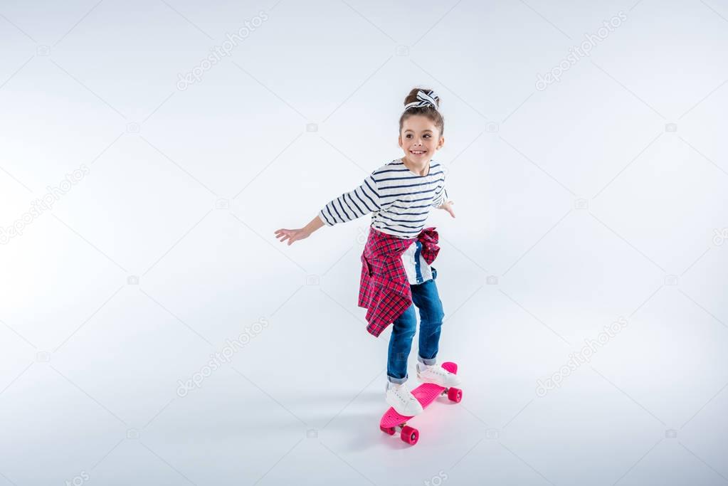 little girl with skateboard