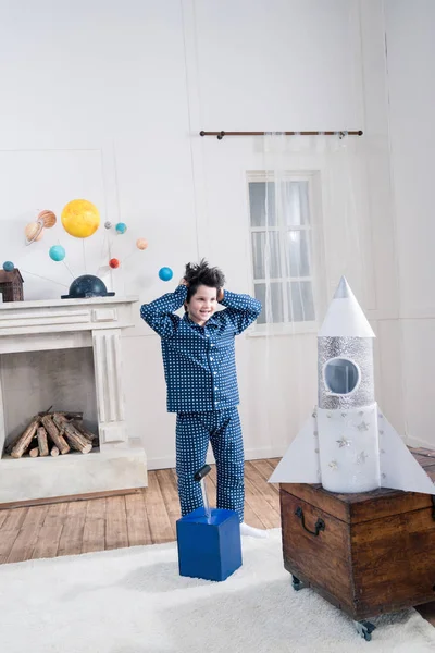 Boy launching rocket — Free Stock Photo