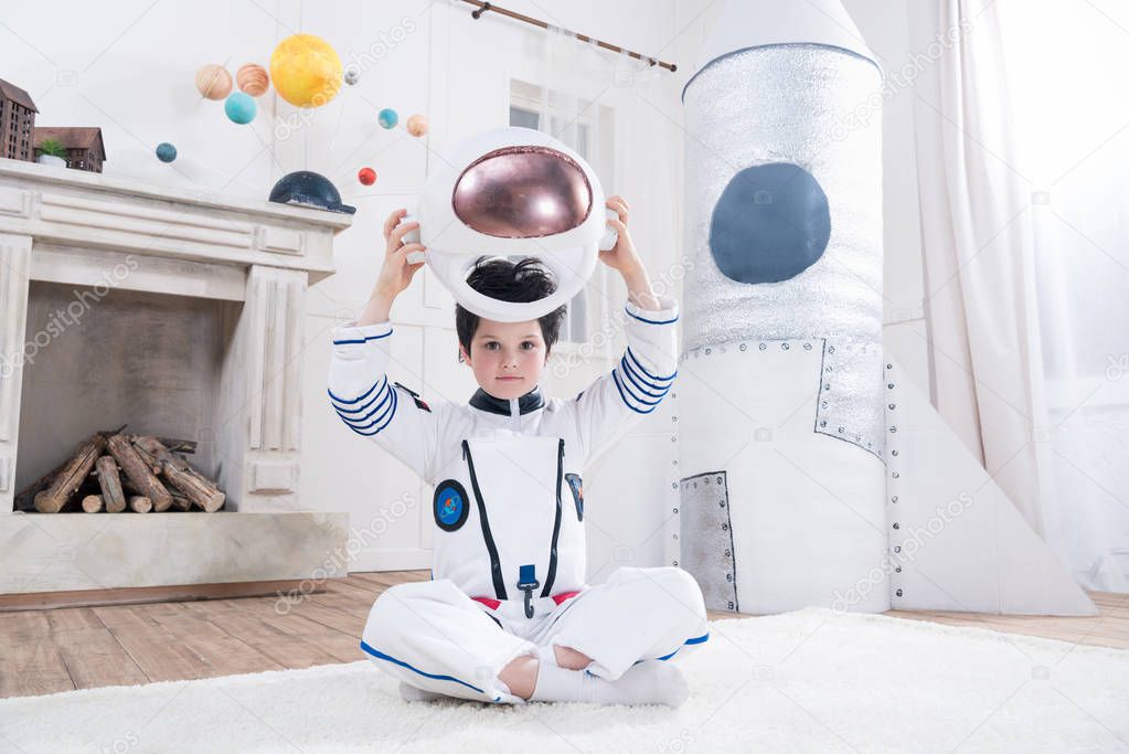 boy in astronaut costume