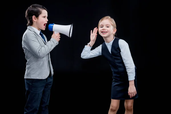 Boy with megaphone yelling on girl — Stock Photo, Image