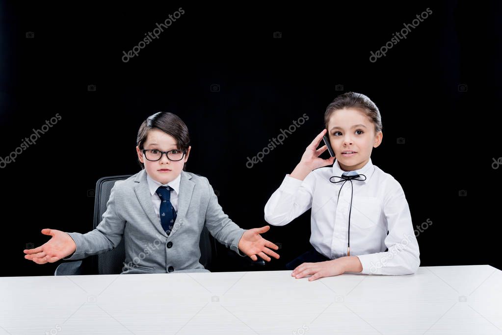 Children playing businesspeople 