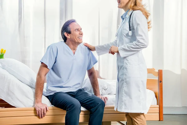 Middle aged patient and doctor — Stock Photo, Image