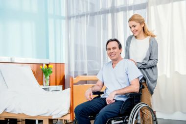 elderly wheelchair man in hospital clipart
