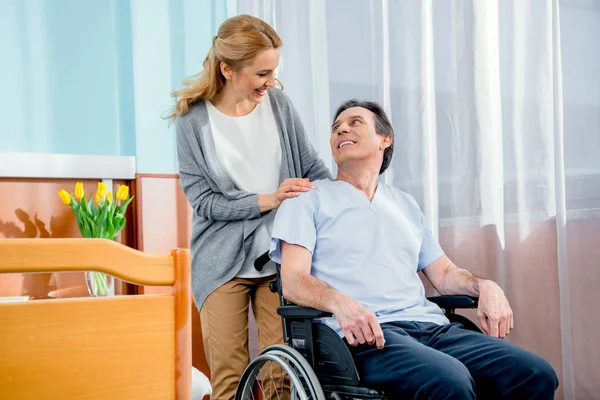 Elderly wheelchair man in hospital — Stock Photo, Image