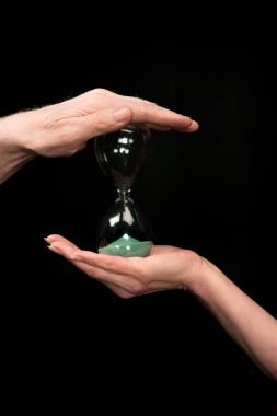 üst düzey çift holding kum saati