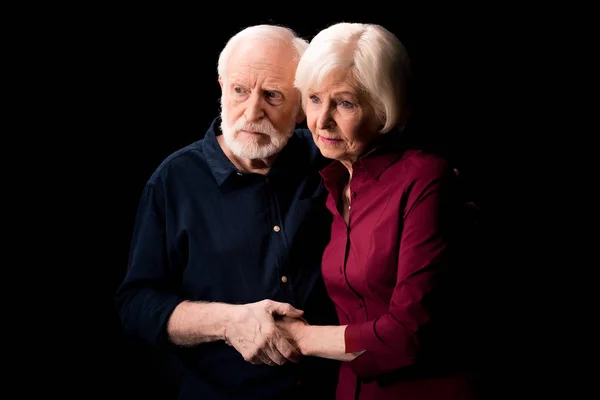 Senior couple holding hands — Free Stock Photo