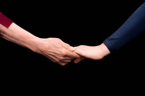 Nieto y abuela tomados de la mano — Foto de Stock