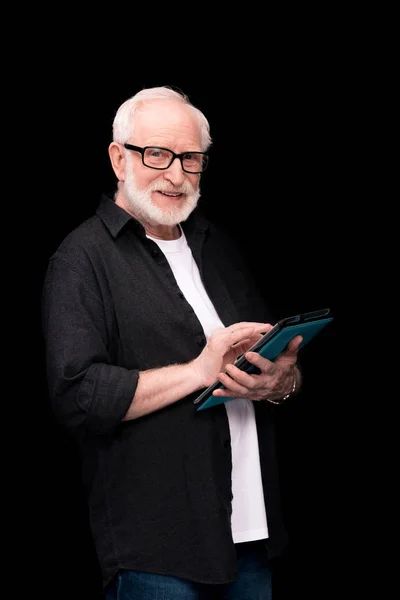 Senior man using tablet — Stock Photo, Image