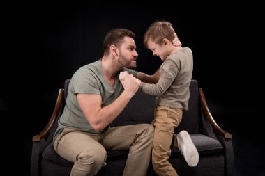 Father and son having conflict clipart