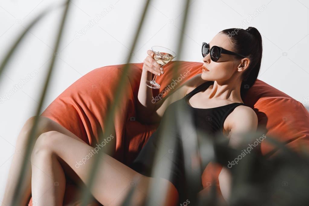 Woman drinking cocktail