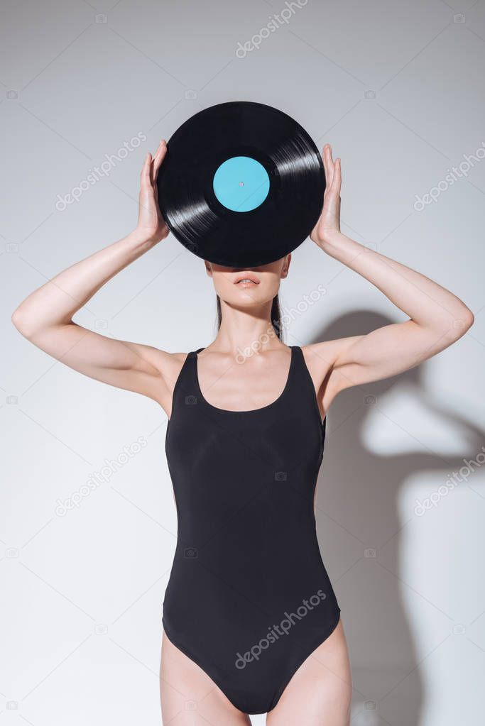 Woman with vinyl record