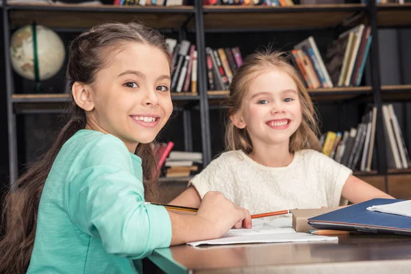 Girls doing homework — Stock Photo