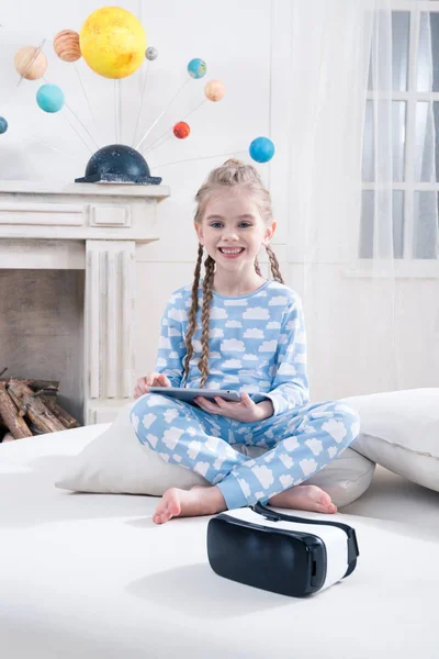 Girl using digital tablet — Stock Photo