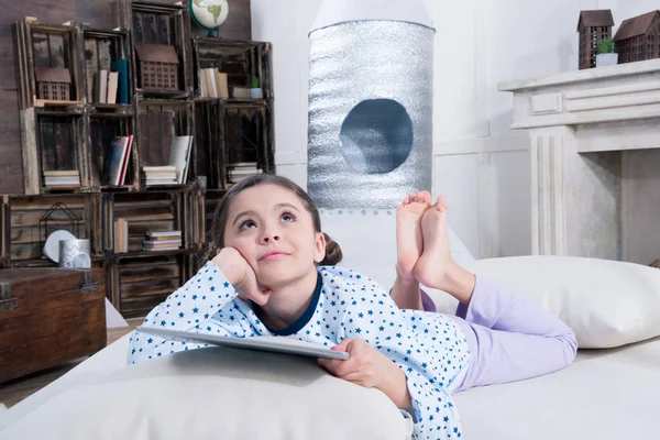 Girl using digital tablet — Stock Photo