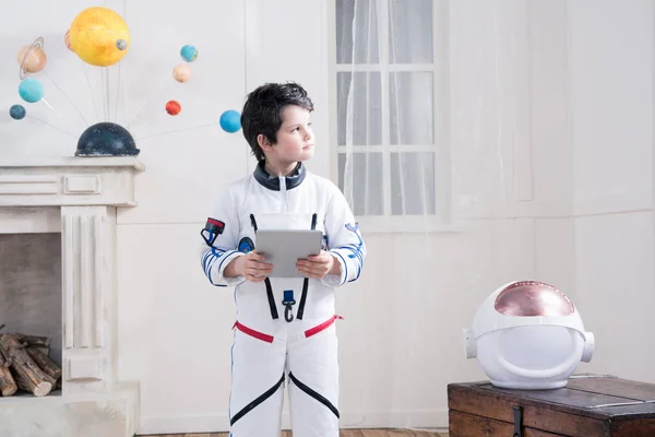 Boy in astronaut costume — Stock Photo