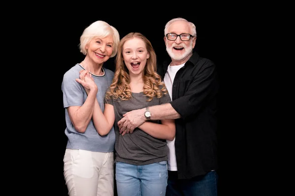 Großeltern mit süßer Enkelin — Stockfoto