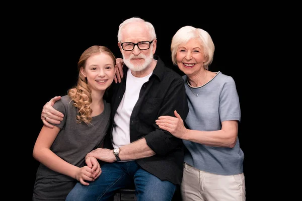Großeltern und Teenager-Enkelin — Stockfoto