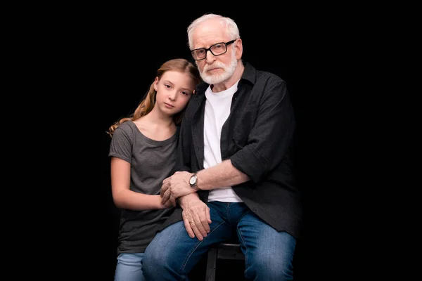 Grandfather and teenage granddaughter — Stock Photo