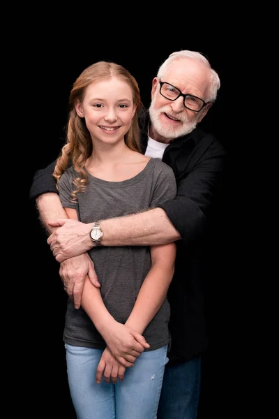 Grandfather and teenage granddaughter — Stock Photo