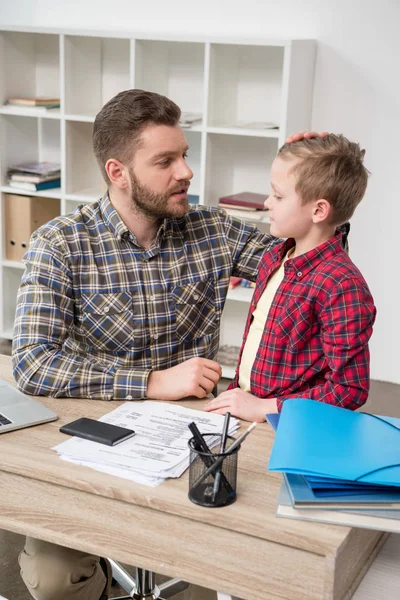 Father hugs his son — Stock Photo