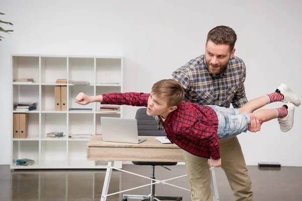 Man having fun with son — Stock Photo