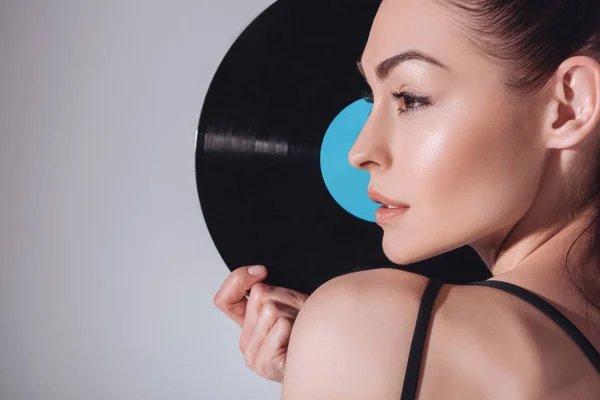 Woman with vinyl record — Stock Photo