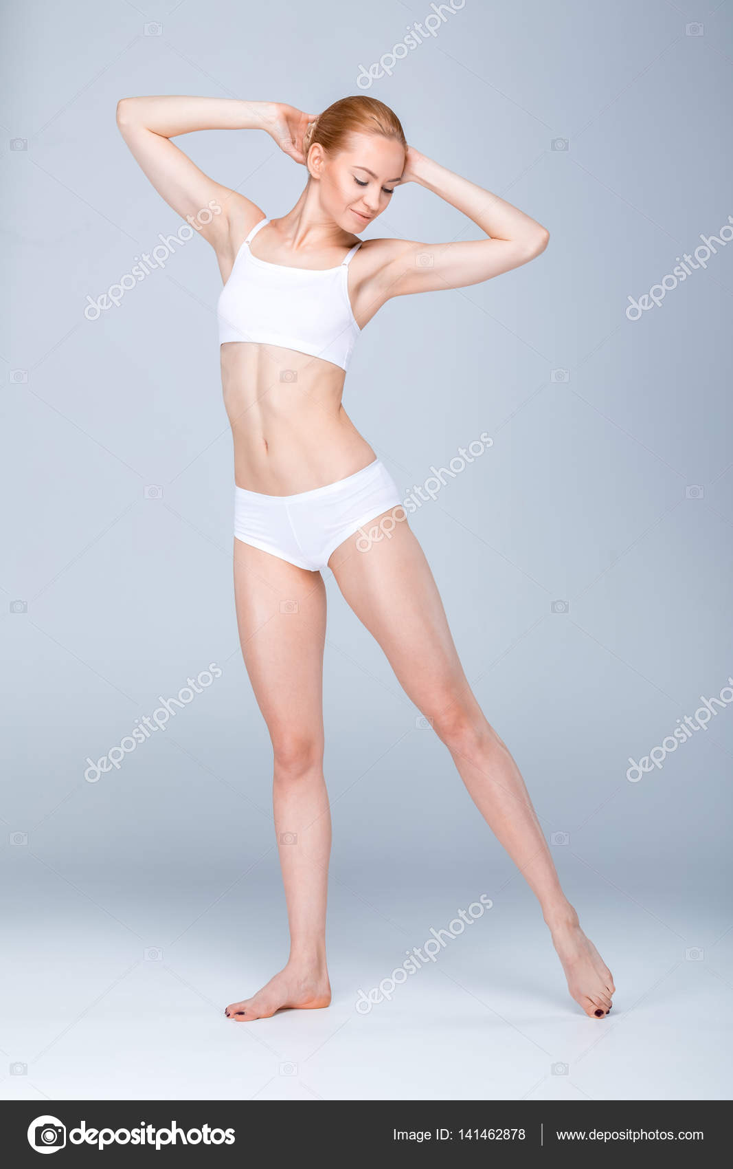 Slim woman in underwear Stock Photo by ©VikaOvcharenko 141462878