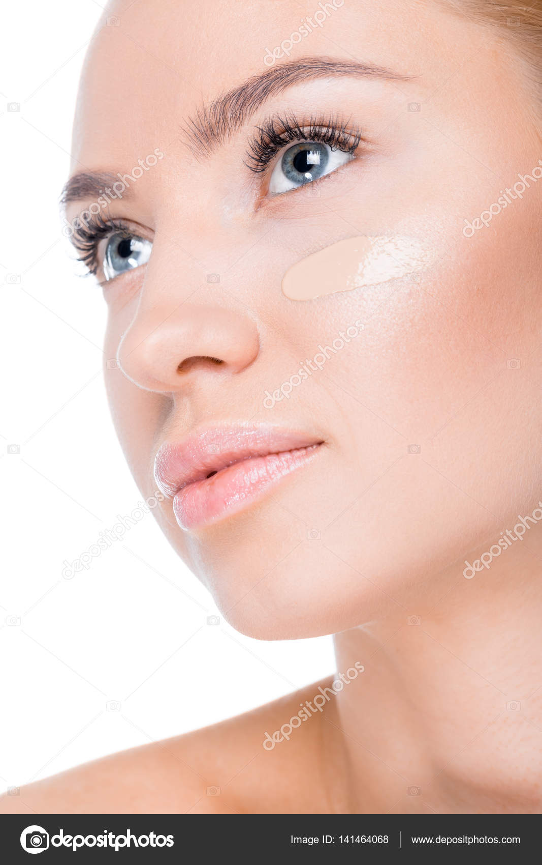 Woman with foundation cream on face — Stock Photo © VikaOvcharenko